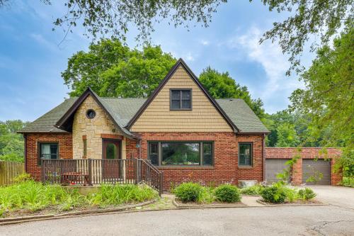 a red brick house with a black roof at Cozy Abode about 3 Mi to Indiana Dunes Natl Park in Chesterton