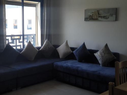Χώρος καθιστικού στο Super appartement vue sur piscine et la plage