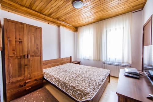 Ένα ή περισσότερα κρεβάτια σε δωμάτιο στο House Perla