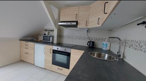 Zöldfa Apartmanház - Tetőtér 3300 Eger, Zöldfa utca 39 kép - 3