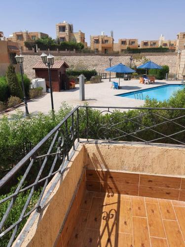 a stairway leading to a swimming pool with at New venisia Resort in Ain Sokhna