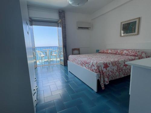 Postel nebo postele na pokoji v ubytování Hotel Ristorante Mareblu