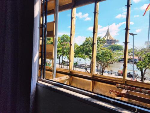 Restaurace v ubytování Upspot Kuching Waterfront Premium Hostel