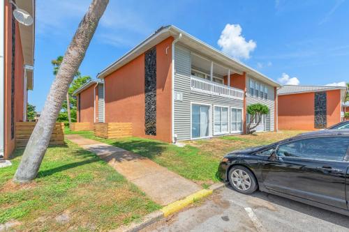 a car parked in front of a house at Catching Rays 3 Comm Pools Family & Pet friendly in Destin