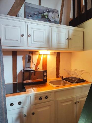 Dapur atau dapur kecil di L'orchidée