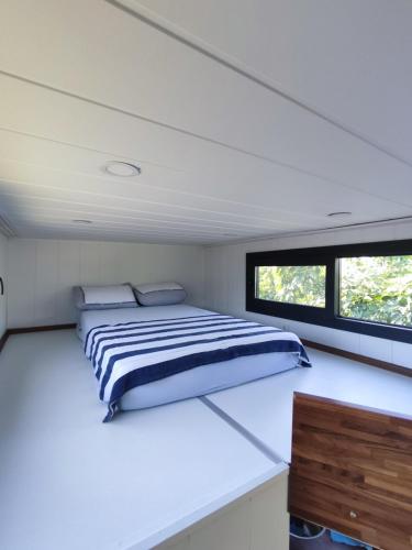 Postel nebo postele na pokoji v ubytování Dikili ZeyTiny House