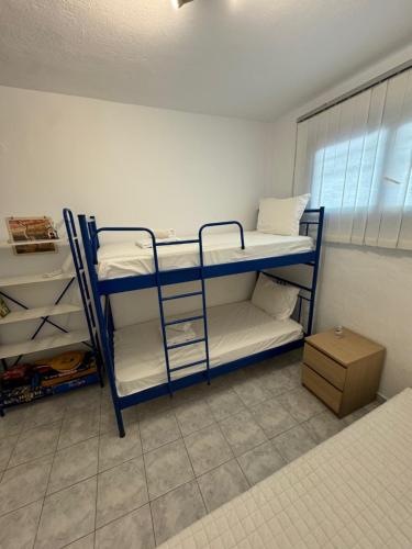 Ένα ή περισσότερα κρεβάτια σε δωμάτιο στο Loutra Agias Paraskevis