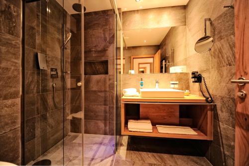 Koupelna v ubytování Hotel Dorfstadl