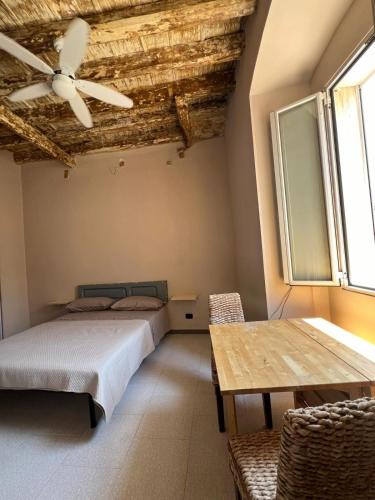 Ένα ή περισσότερα κρεβάτια σε δωμάτιο στο Trulli & Case Fichi 3