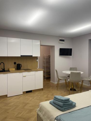 Η κουζίνα ή μικρή κουζίνα στο Apartamenty 91