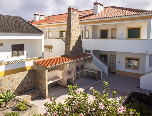 a view of the courtyard of a house at Clifftop Nest Arrifana in Aljezur