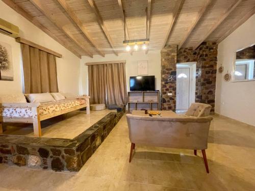 Postel nebo postele na pokoji v ubytování Kenny's Villa