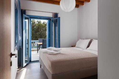 Postel nebo postele na pokoji v ubytování Aegean Seasons