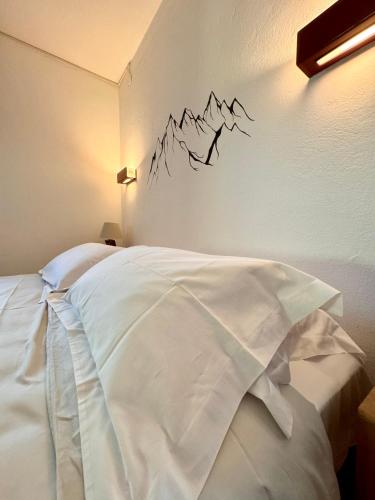 Postel nebo postele na pokoji v ubytování Villa Drago Chalet