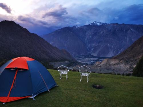 two chairs and a tent on top of a mountain at Cosy Camping Site Hapakun by Manokur- e- Basa in Minapin