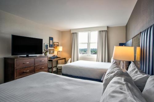 Una cama o camas en una habitación de Hotel Gettysburg