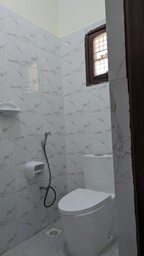 Ванная комната в JACARANDA HOMESTAY