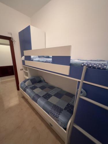 Palanda nebo palandy na pokoji v ubytování Casa Vacanza IsaCla
