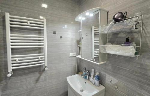 Ένα μπάνιο στο Resort Bakuriani Apartment