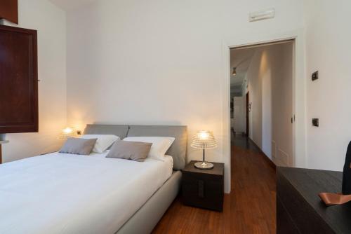 Letto o letti in una camera di ca'santoro - locazioni turistiche