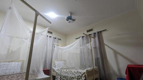 Ванная комната в JACARANDA HOMESTAY