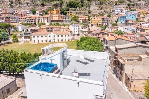 an image of a house on top of a city at Barighouse in Ulassai