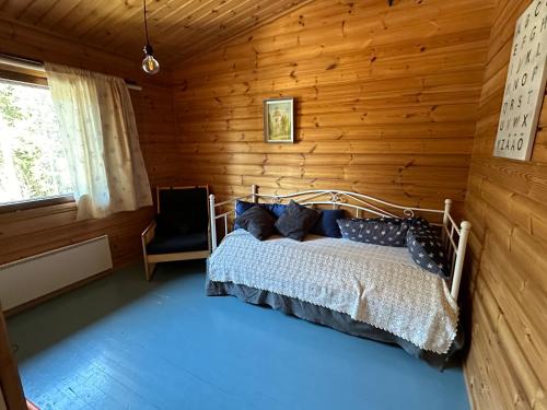 Ένα ή περισσότερα κρεβάτια σε δωμάτιο στο Villa Marcie