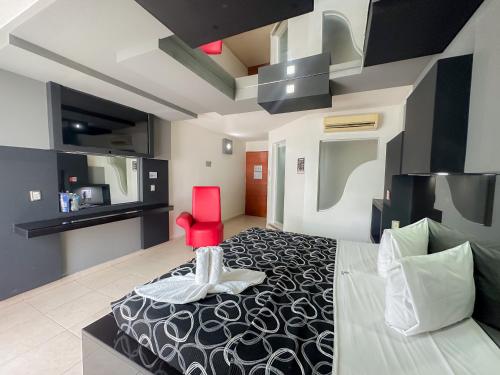 Auto Hotel Mediterráneoにあるベッド