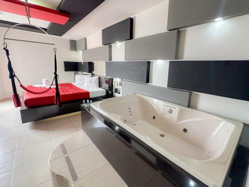 Postel nebo postele na pokoji v ubytování Auto Hotel Mediterráneo