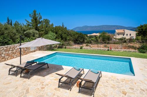 a swimming pool with two chairs and an umbrella at Blue Villa in Sami