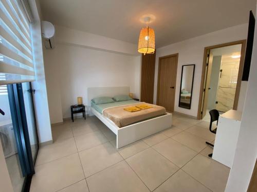 Postel nebo postele na pokoji v ubytování Acogedor Apartamento Céntrico