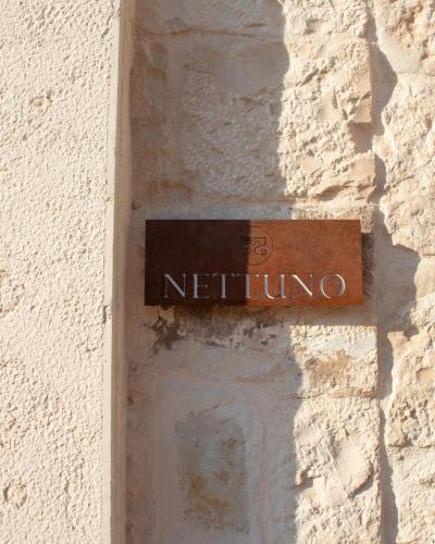 a sign on the side of a building at San Michele in Turi