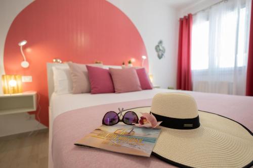 Posteľ alebo postele v izbe v ubytovaní Golden Holiday 2 Ville con piscine indipendenti e separate