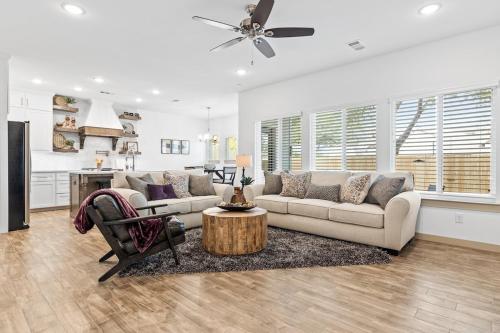 a living room with a couch and a table at Lone Star Escape in Arlington