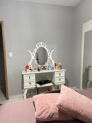 Ένα ή περισσότερα κρεβάτια σε δωμάτιο στο Quarto em casa aconchegante