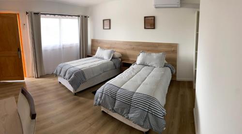 Postel nebo postele na pokoji v ubytování Casa Parral Hostal