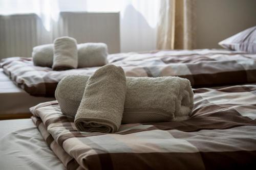 Ízisz Apartmanにあるベッド