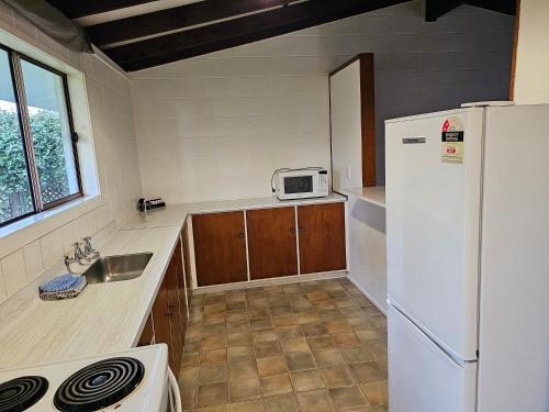Kuchyň nebo kuchyňský kout v ubytování Amisfield motel