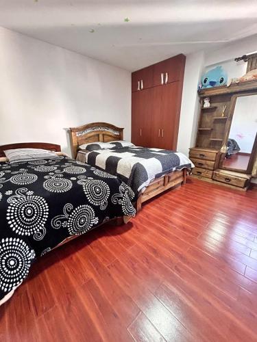 Llit o llits en una habitació de Dpto MANU