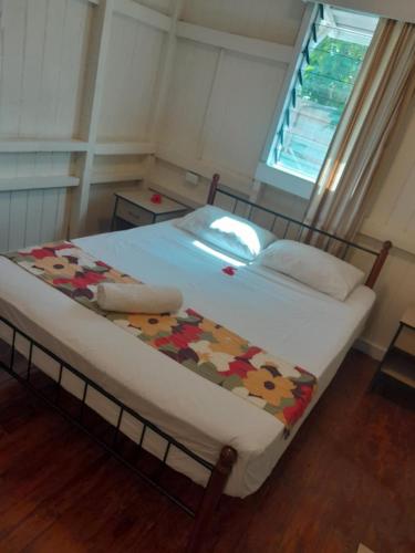 Ein Bett oder Betten in einem Zimmer der Unterkunft New Mavida Lodge