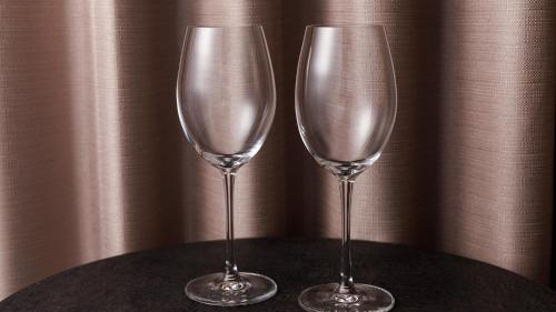 two champagne glasses sitting on top of a table at JR East Hotel Mets Premier Yokohama Sakuragicho in Yokohama
