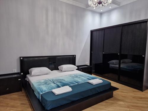 Ένα ή περισσότερα κρεβάτια σε δωμάτιο στο Green City Residence