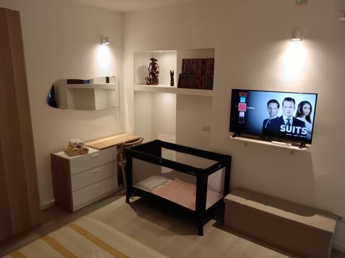 La Divina Suitesにあるテレビまたはエンターテインメントセンター