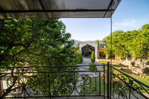 a view from the balcony of a house at Kefilyan Family Hotel in Haghpat