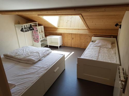Postel nebo postele na pokoji v ubytování Les biches du Soula 5 couchages proche piste ski