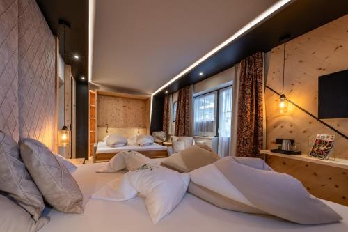 Sylvana's Wohlfühl Hotelにあるベッド