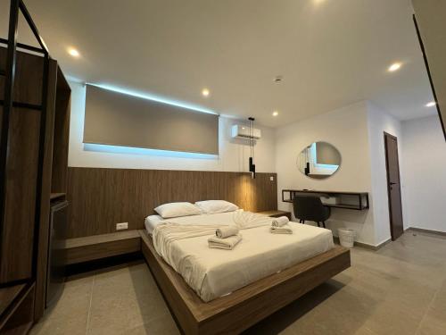 Ένα ή περισσότερα κρεβάτια σε δωμάτιο στο Delfinia Luxury Residence