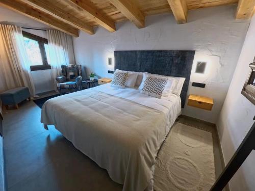 Postel nebo postele na pokoji v ubytování Las Horneras de Cobeta Apartamento Florencia