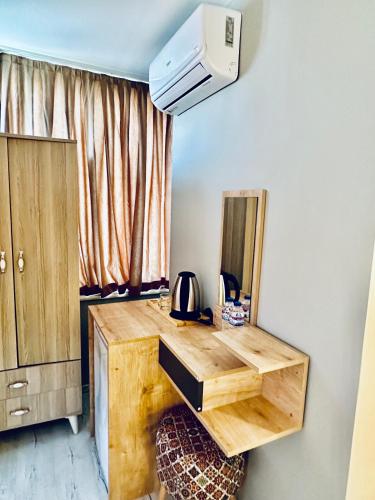 Η κουζίνα ή μικρή κουζίνα στο The Hera Gold Hotel