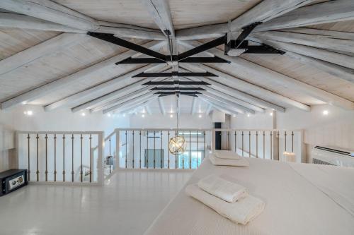 Ένα ή περισσότερα κρεβάτια σε δωμάτιο στο Chroma Pelion Villas